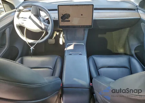 2022 Tesla Model Y из США, поврежденный, VIN 7SAYGDEE0NA022227